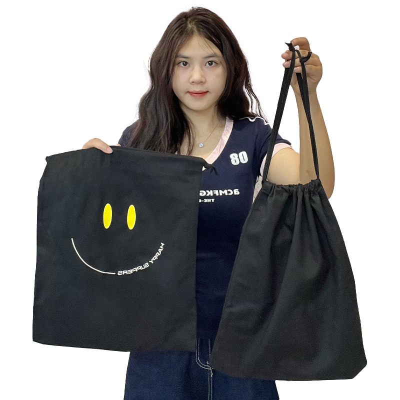 Black canvas drawstring bag