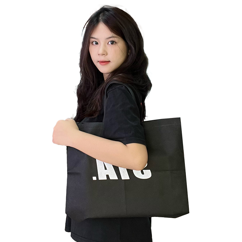 Various sizes of black non-woven bags
