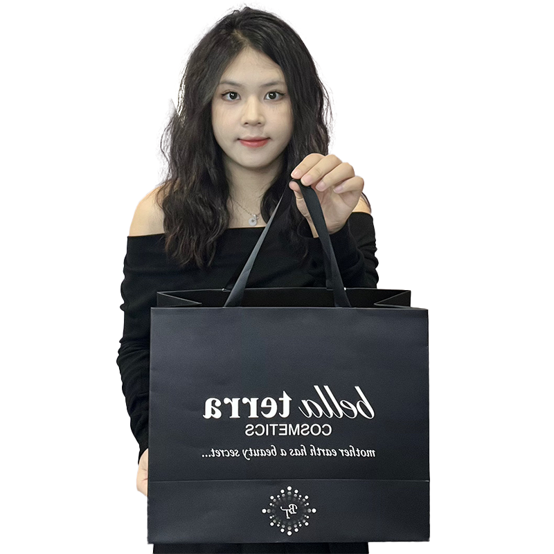 Various sizes of black card paper bags