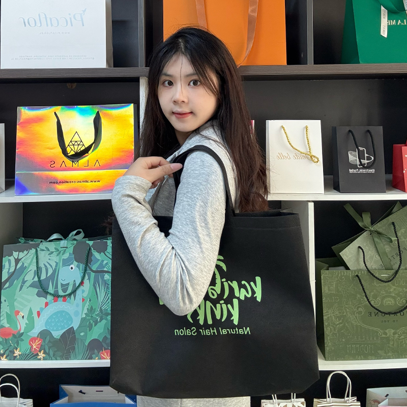 Black non-woven green printed tote bag
