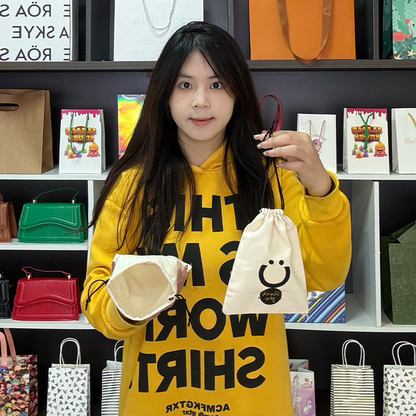 Off-white cotton drawstring bag