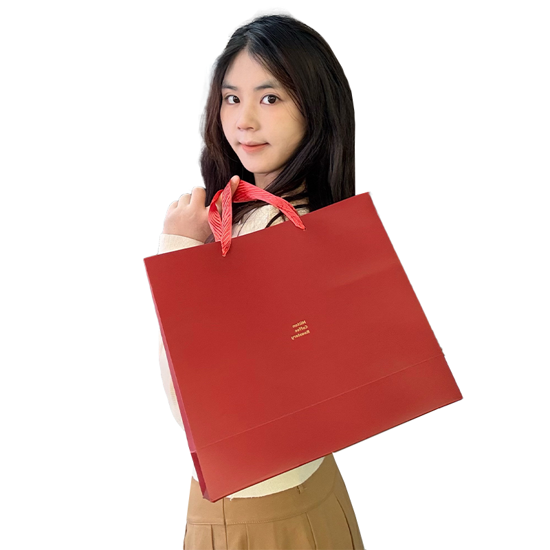 Red gold stamped paper bag