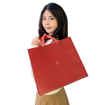 Red gold stamped paper bag