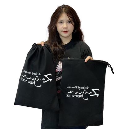 Black cotton drawstring bag