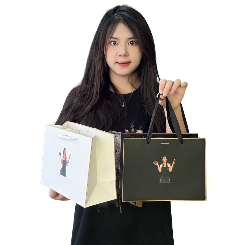 Black and white same style gold-painted paper bag