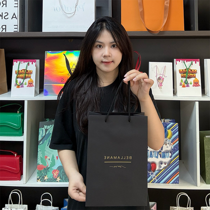 Black card tote bag with gold pattern