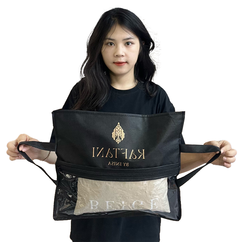 Black non-woven packaging bag with middle zipper and transparent skylight design at the bottom