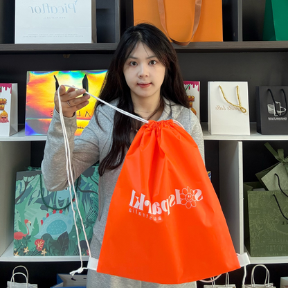 Orange drawstring backpack bag