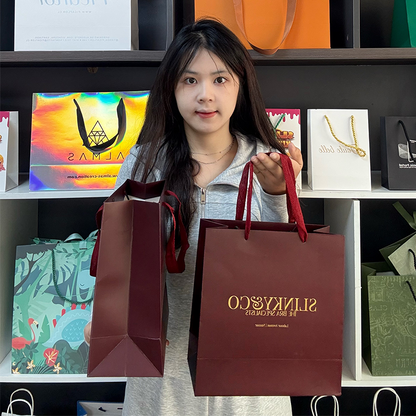 Red paper bag with gold stamping pattern