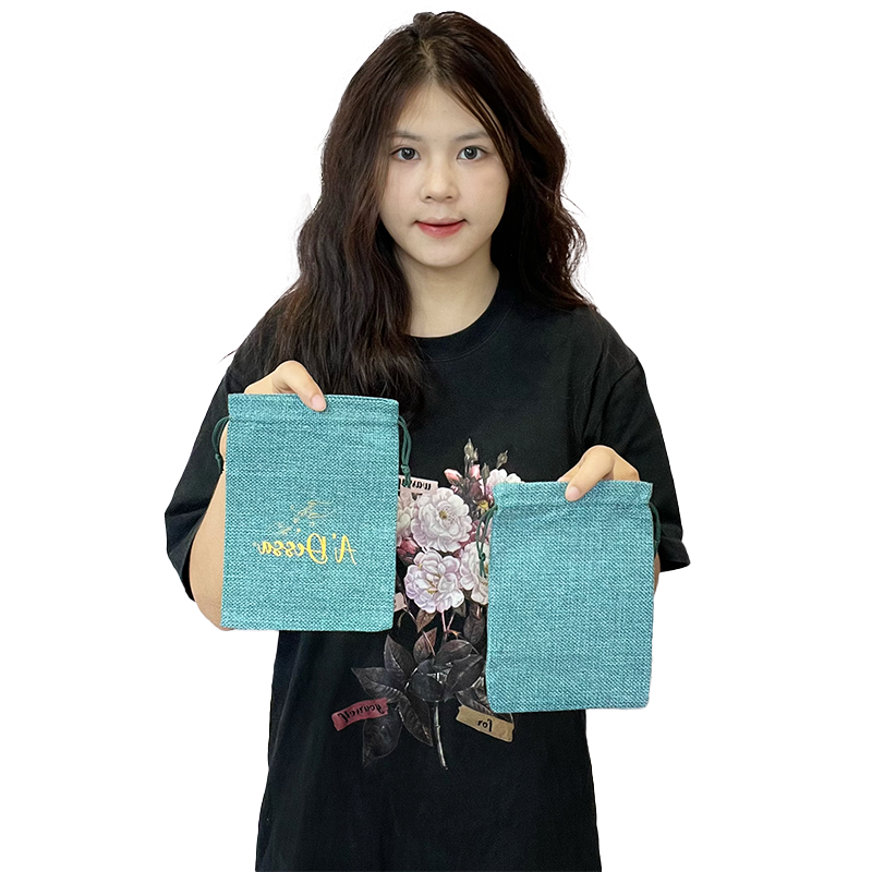 Small size green gold stamped linen drawstring bag
