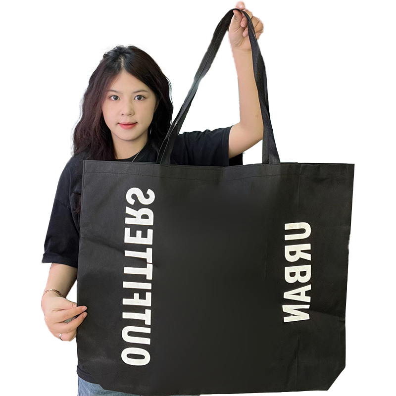 Various sizes of black non-woven bags