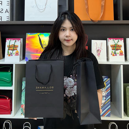 Black card tote bag with gold pattern